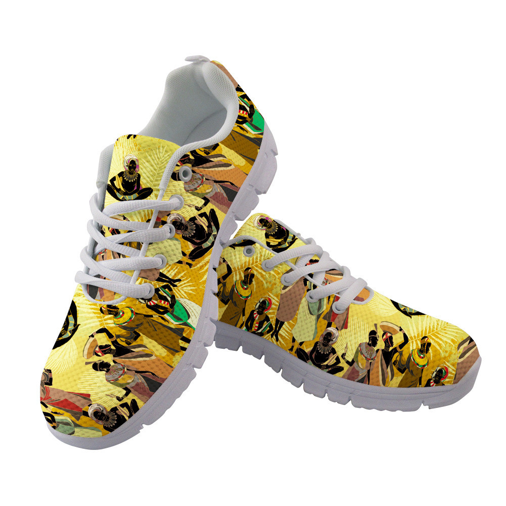 People Of South Africa In National Clothes On Gold Leaves Background Running Shoes Sport Sneakers